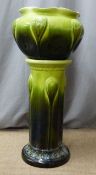 An earthenware jardiniere on stand, H82cm