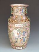 Chinese/Canton ware floor vase decorated with court scenes and relief moulded lizards to the neck