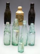 Eight various mainly glass bottles including Crockett's Worcester, Brown & Co, Stroud; Stroud