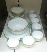 A collection of blue, cream and gilt teaware, probably Minton