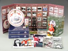 A collection of football memorabilia and autographs including a Gordon Banks signed photo, Geoff