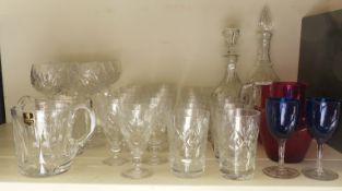 A suite of cut glass by Webb Corbett, two Edinburgh crystal tankards, two cranberry glass jugs and