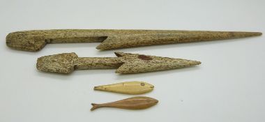 19thC Inuit bone harpoon and spear head together with two carved fish, probably jigging lures,