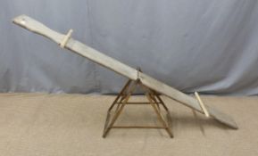 Vintage child's see-saw garden toy, length 188cm
