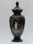 19thC Mary Gregory amethyst covered pedestal glass vase, H42cm tall