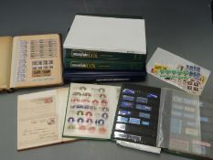 Sundry stockbooks of PHQ cards, embossed blocks and multiples etc together with two albums of