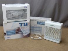 Three electric insect killers including Insect-a-clear, Insect-o-cutor and a Titan 300, all boxed