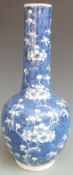 A 19thC/ early 20thC Chinese blue and white prunus vase, 30cm tall