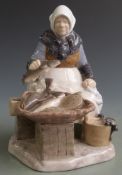 Bing and Grondahl Copenhagen figure of a female fish seller with basket of fish and container of