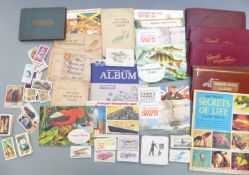 A quantity of cigarette and tea cards including Downland Anstie racing colours, Player's Flags,