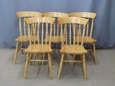 A set of five pine Windsor dining chairs