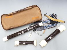 Aulos composite bodied bass recorder, in soft carry case with shoulder strap no. 533-EB