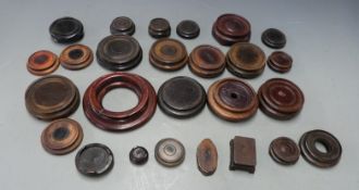 Approximately twenty 19th/20thC Chinese hardwood stands, largest 14cm