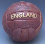 Sir Geoff Hurst and Martin Peters signed leather replica England football.