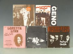 Approximately 250 singles from the 1970's and 1980's