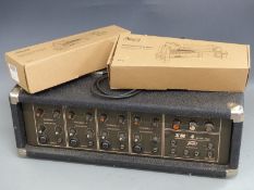 Peavey X M-4 amplifier and two guitar stands