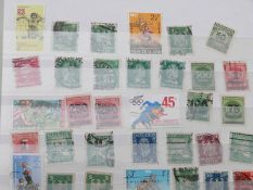 Seven albums and stockbooks of old world stamps