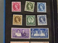 Two small stockbooks of mainly GB stamps, an album and first day covers