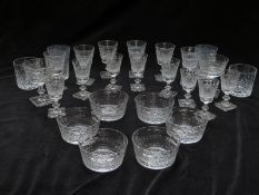 A suite of Edinburgh Crystal glasses comprising eight sherry glasses, six white wine glasses, two