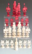 Chinese carved bone puzzleball part chess set, approximately 24 pieces (two with no puzzleballs),