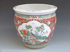 A large Chinese jardiniere, 39cm tall, 36cm diameter