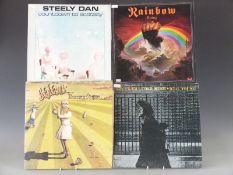 Approximately 80 albums including Steely Dan, Bruce Springsteen, Rainbow, Mike Oldfield, Elton John,
