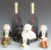 Three Sandland Martell brandy figural water jugs, Black and White whisky advertising figure, two '