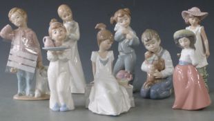 Eight Nao child figures, tallest 18cm