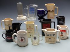 Fourteen mainly pub interest jugs including Flowers, Beefeater, Senior Service, Teacher's and T K