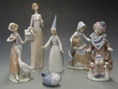 Five Lladro figures including Collector's Club clown with puppies, tallest 34cm