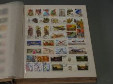 Stockbook of mint and used stamps from Russia, including mini sheets etc