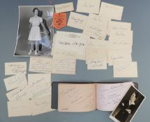 Collection of autographs on calling cards and in an autograph book to include 1930's tennis stars