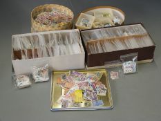 A large quantity of all world stamps, loose and in packets