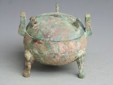 Chinese ding/bronze tripod vessel and cover with handwritten collector's label, possibly Zhou