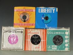 Approximately 350 singles from the 1960's