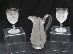 Richardsons cut glass ewer and two goblets, the ewer with part frosted finish, 28cm tall