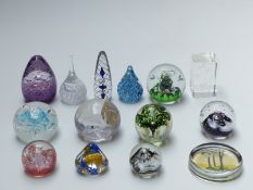 Fourteen paperweights including Caithness, Ruth Brinkman, Langham etc, some with certificates of