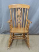 A beech Windsor rocking chair, H112cm