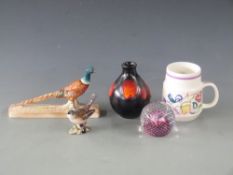 Beswick pheasant model 1774, Poole pottery vase and mug and Caithness paperweight