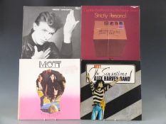 Approximately 140 albums including David Bowie, Rolling Stones, Alex Harvey and The Jam