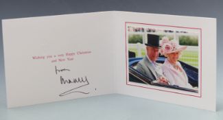 HRH Prince Charles and Camilla photographic Christmas card depicting the couple in a carriage,
