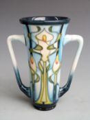 Moorcroft twin handled loving cup decorated with Arum lilies dated 2001, boxed, H15cm