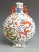 A Chinese moon flask with dragon decoration and Kangxi mark to base, 40cm tall