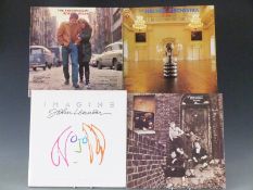 Approximately 80 albums, including Bob Dylan, The Who, The Beatles, E.L.O., The Rolling Stones,