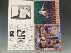 Approximately 120 albums including Squeeze, Police, Tom Petty, Slade, Rod Stewart and B J Thomas