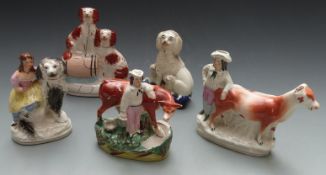 Five Staffordshire figures including a cow creamer, girl with dog etc, tallest 21cm