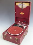 National Band wind up gramophone in maroon Rexine finish together with a small selection of 78 rpm