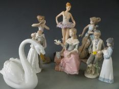 Collection of Lladro style figures and a Hollohaza swan, tallest 34cm