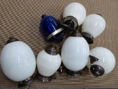 Five various glass globe shaped light fittings, height of tallest 48cm