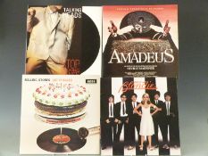 Approximately 100 albums including Tom Petty, Talking Heads, Robert Palmer, U2, Prince, Bruce